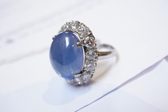 A sapphire and diamond ring, mid 20th century
